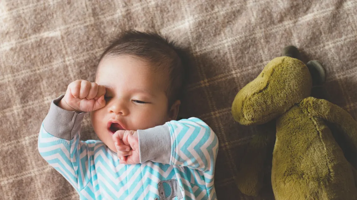 Why newborns fight sleep — and how to help them settle